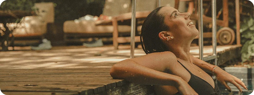 Person looking up while swimming