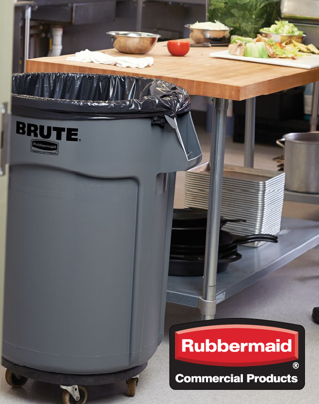 Rubbermaid BRUTE® commercial trash container on casters positioned beside a food prep table in a professional kitchen setting.