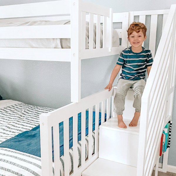 Blue boy's room with bunk bed with stairs
