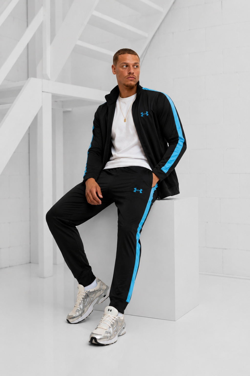 Image of Under Armour Rival Knit Trainingspak Heren Zwart/Blauw