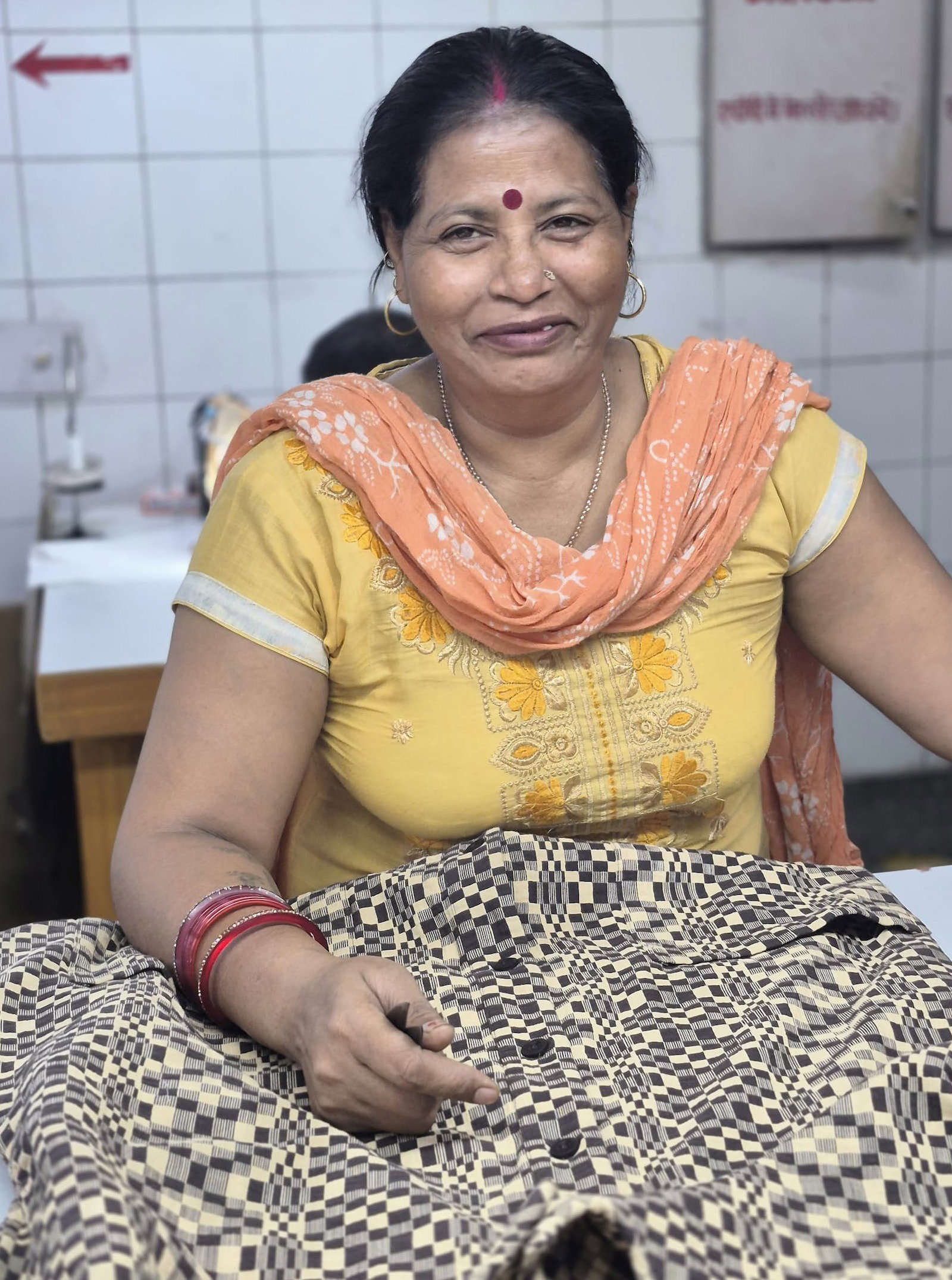 Woman quality checking new styles