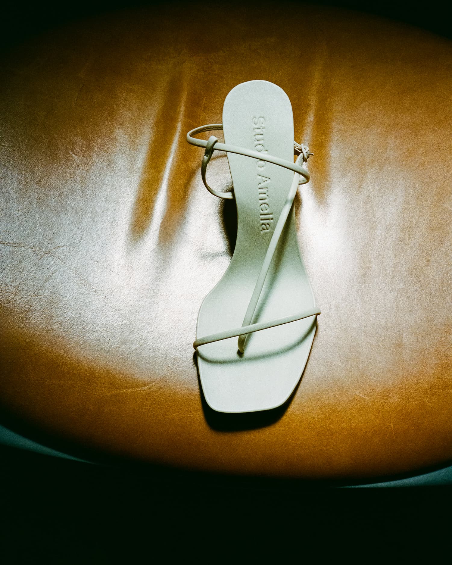 A white cross front 70 heel by Studio Amelia