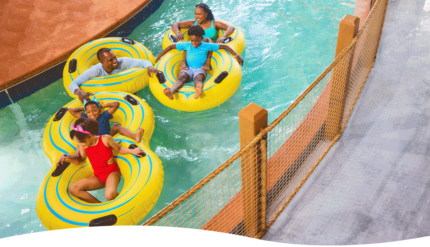 Family on a lazy river with animated paw print graphic overlay