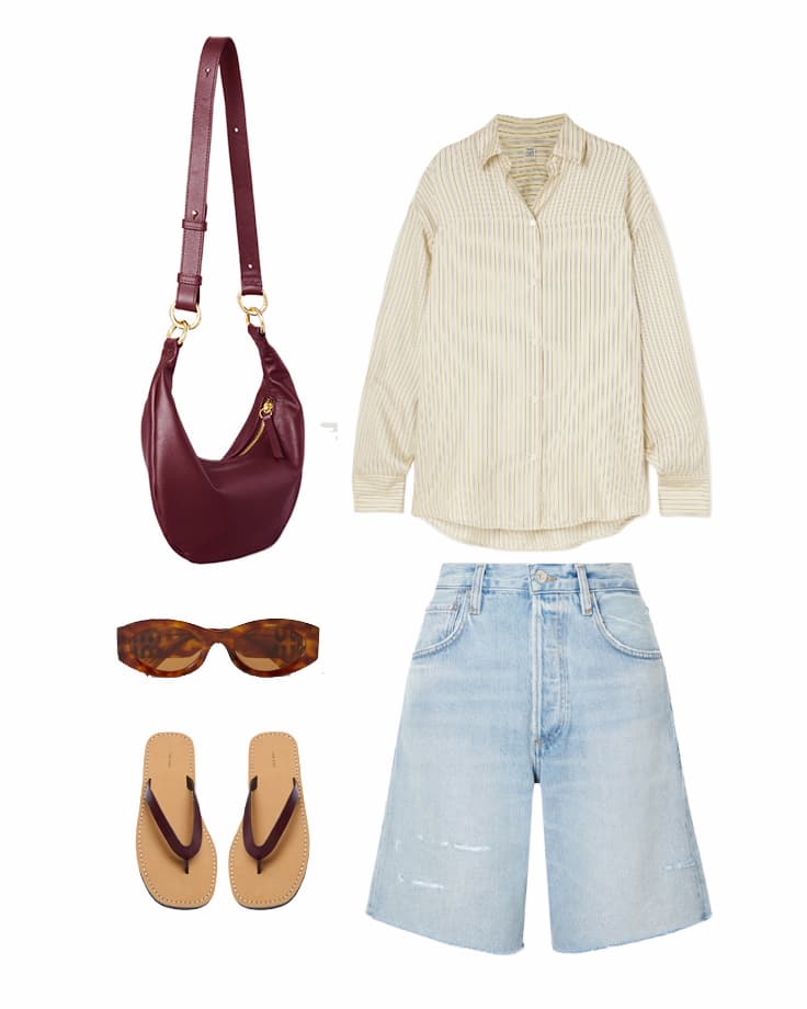 The HYER GOODS La VIa weekender in Cognac, atop a carryon rollerboard