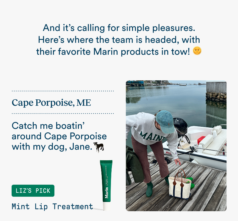 A team member bends down on a dock beside a small boat in Cape Porpoise, Maine, wearing a gray Maine sweatshirt and green boots. Text reads: “Catch me boatin’ around Cape Porpoise with my dog, Jane.” Featured product: Mint Lip Treatment.