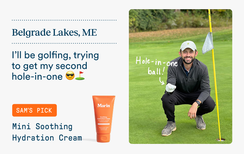 A smiling man kneels beside a golf hole in Belgrade Lakes, Maine holding a golf ball, with handwritten doodle text reading “Hole-in-one ball!” Text says he’ll be golfing and trying to get his second hole-in-one. Featured product: Mini Soothing Hydration Cream.