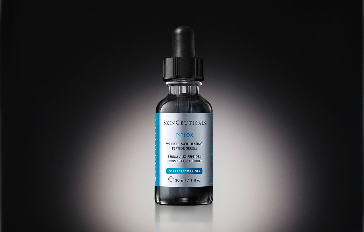 30ml P-TIOX Serum vor schwarzem Hintergrund