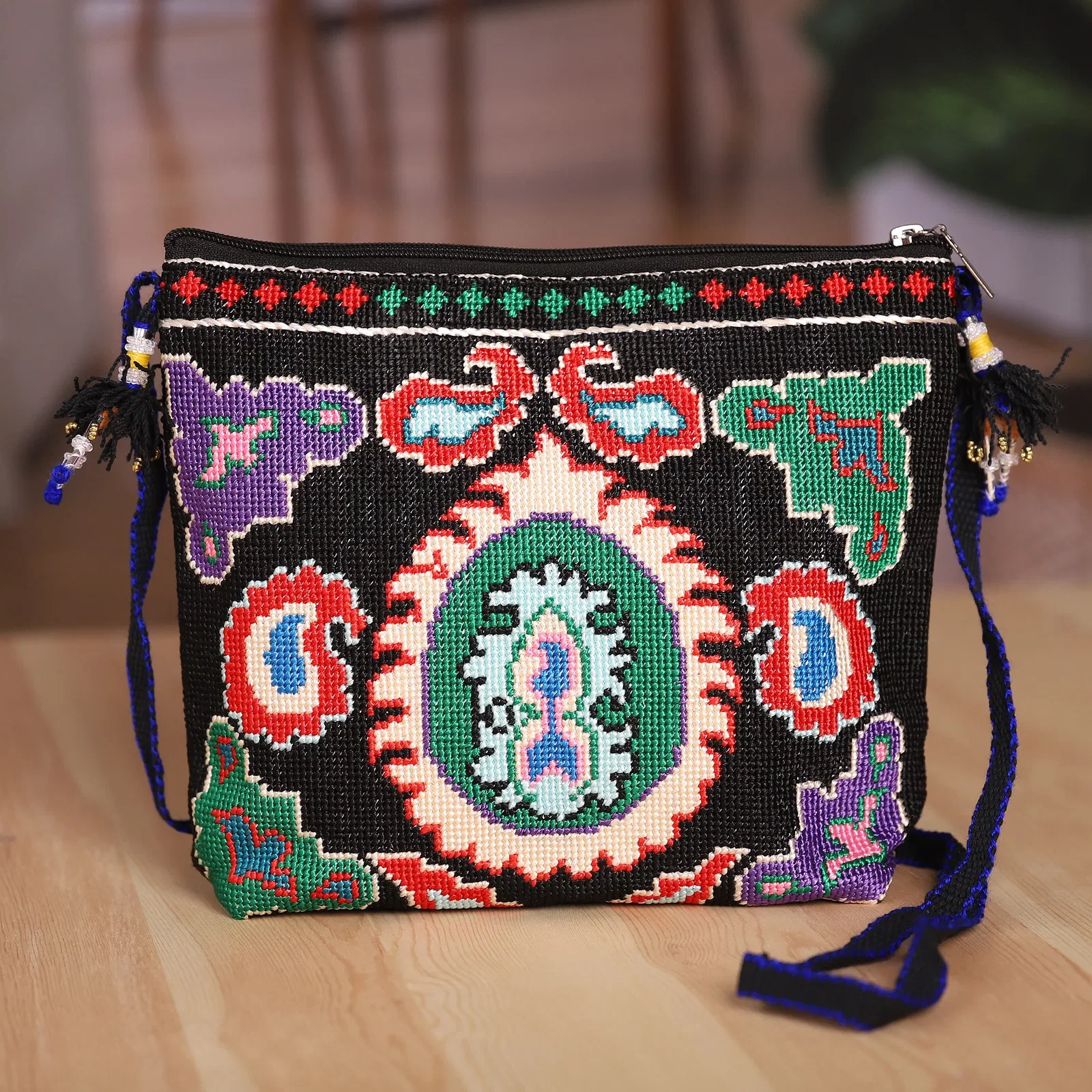 Image of Traditional Iroki Embroidered Black Sling with Tassels - Palatial Nights