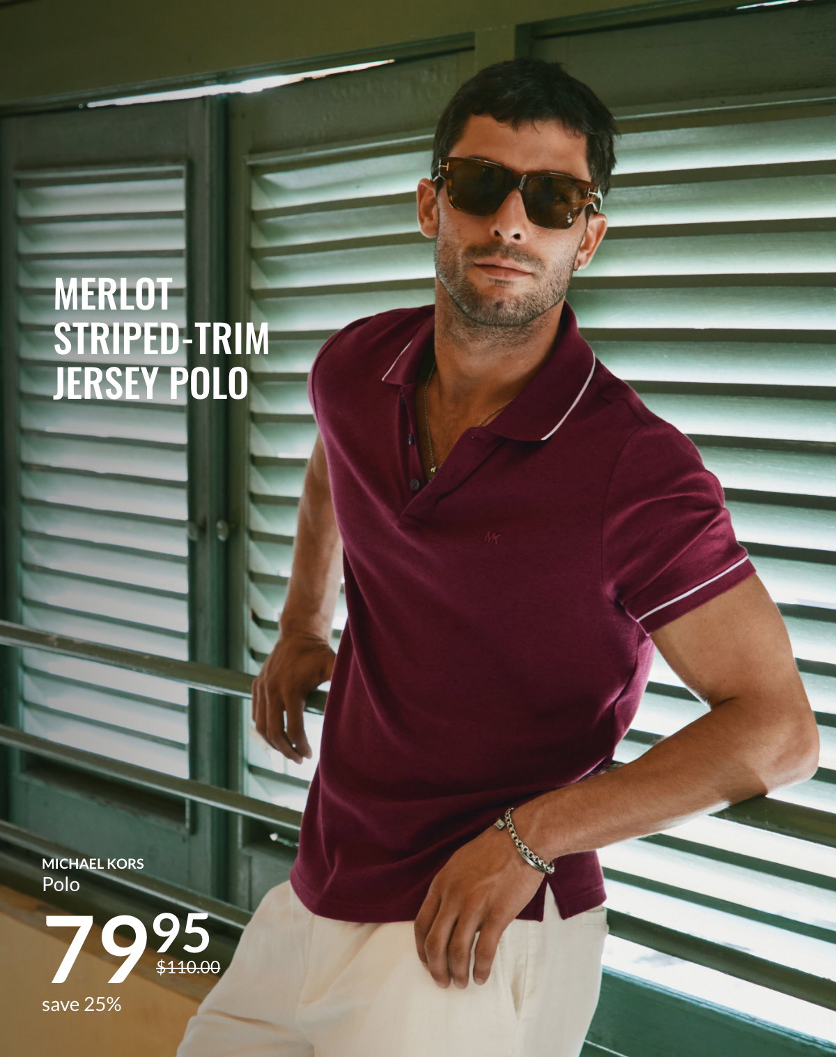 Merlot striped-trim polo by Michael Kors at 79.95$ intead of 100.00$