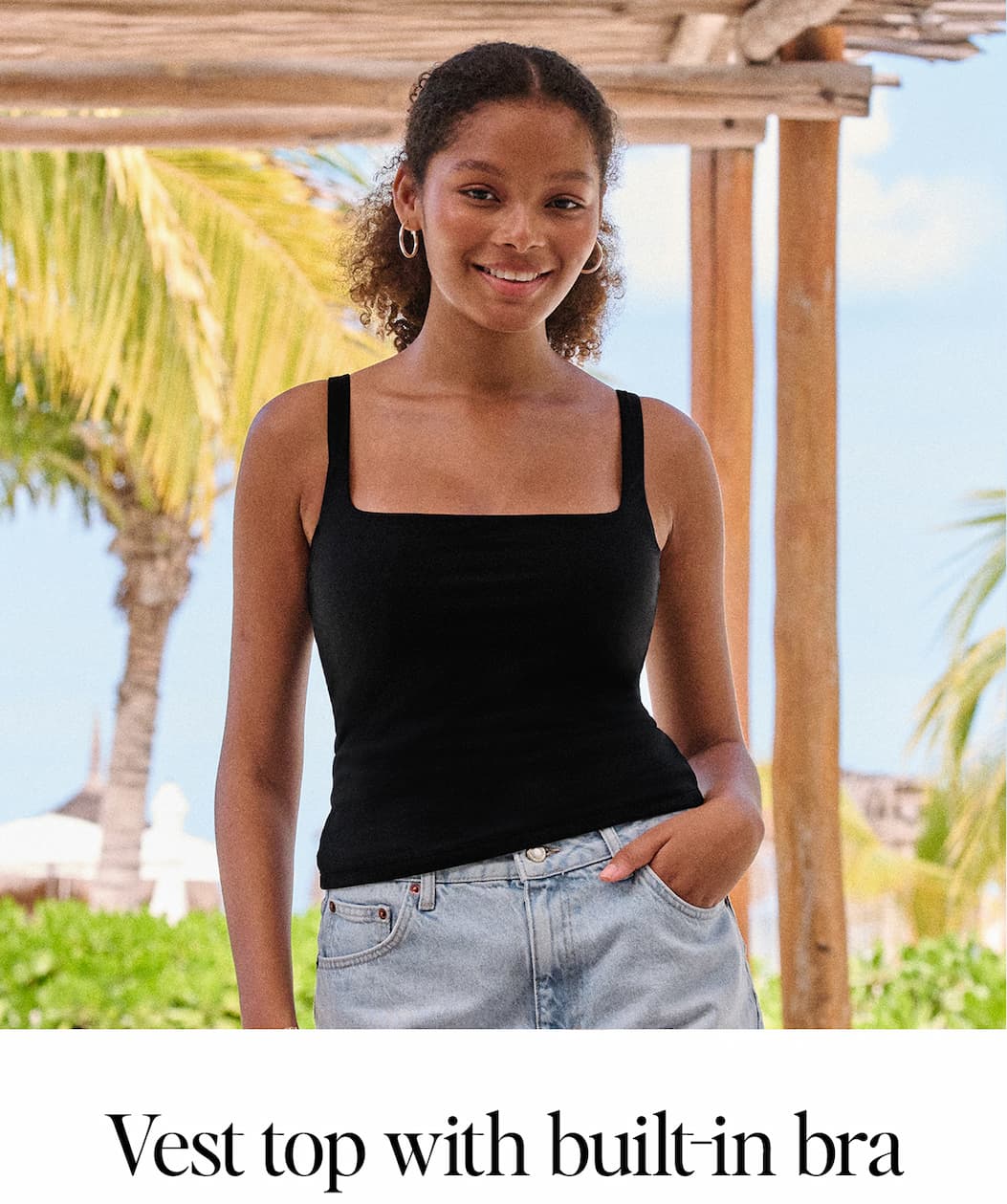 Vest top with built-in bra. Sophia wears new Square Neck Vest Top in black