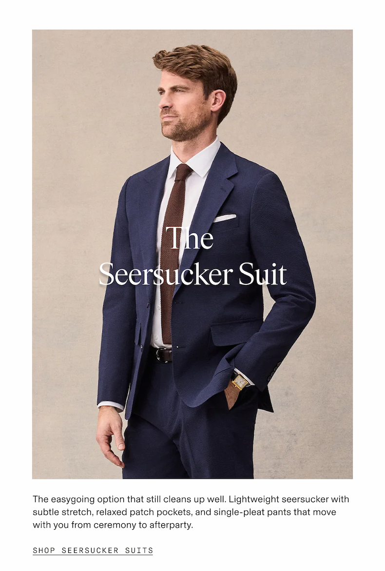 Man wearing a navy seersucker suit with a white dress shirt, brown knit tie, and white pocket square, gazing to the side against a warm beige background. The Seersucker Suit. The easygoing option that still cleans up well. Lightweight seersucker with subtle stretch, relaxed patch pockets, and single-pleat pants that move with you from ceremony to afterparty. SHOP SEERSUCKER SUITS