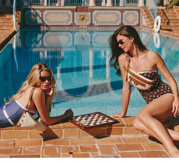 models by pool with west end bags