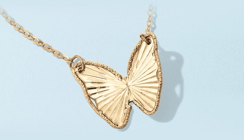 Yellow gold butterfly necklace.