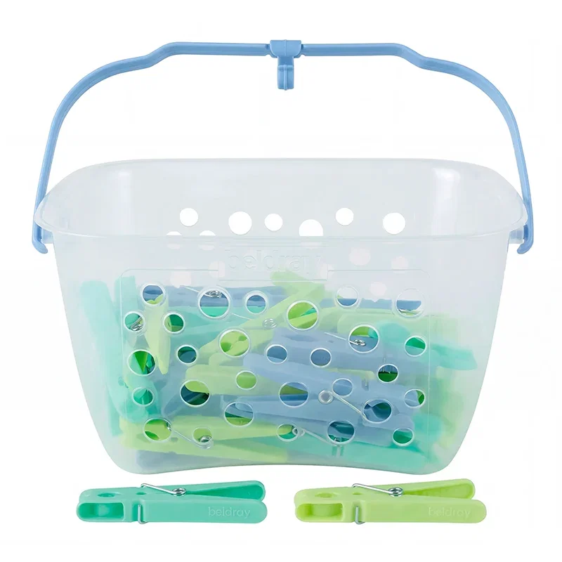 Blue and green pegs in a clear basket