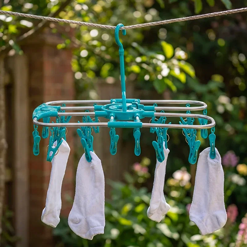 Sock airer hanging on washing line outside