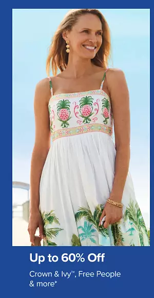 A woman in a white dress. Up to 60% off Crown and Ivy, Free People and more.