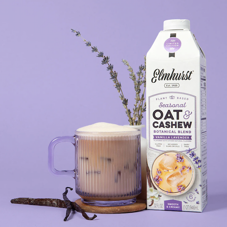 Oat and Cashew Vanilla Lavender with a glass of iced coffee and lavender springs.