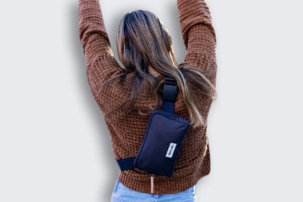Woman wearing belt bag