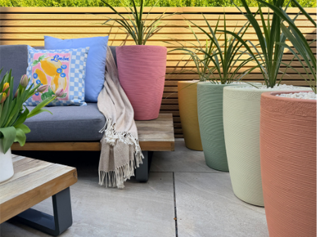 An image of a selection of garden pots painted in limited edition Al Fresco
