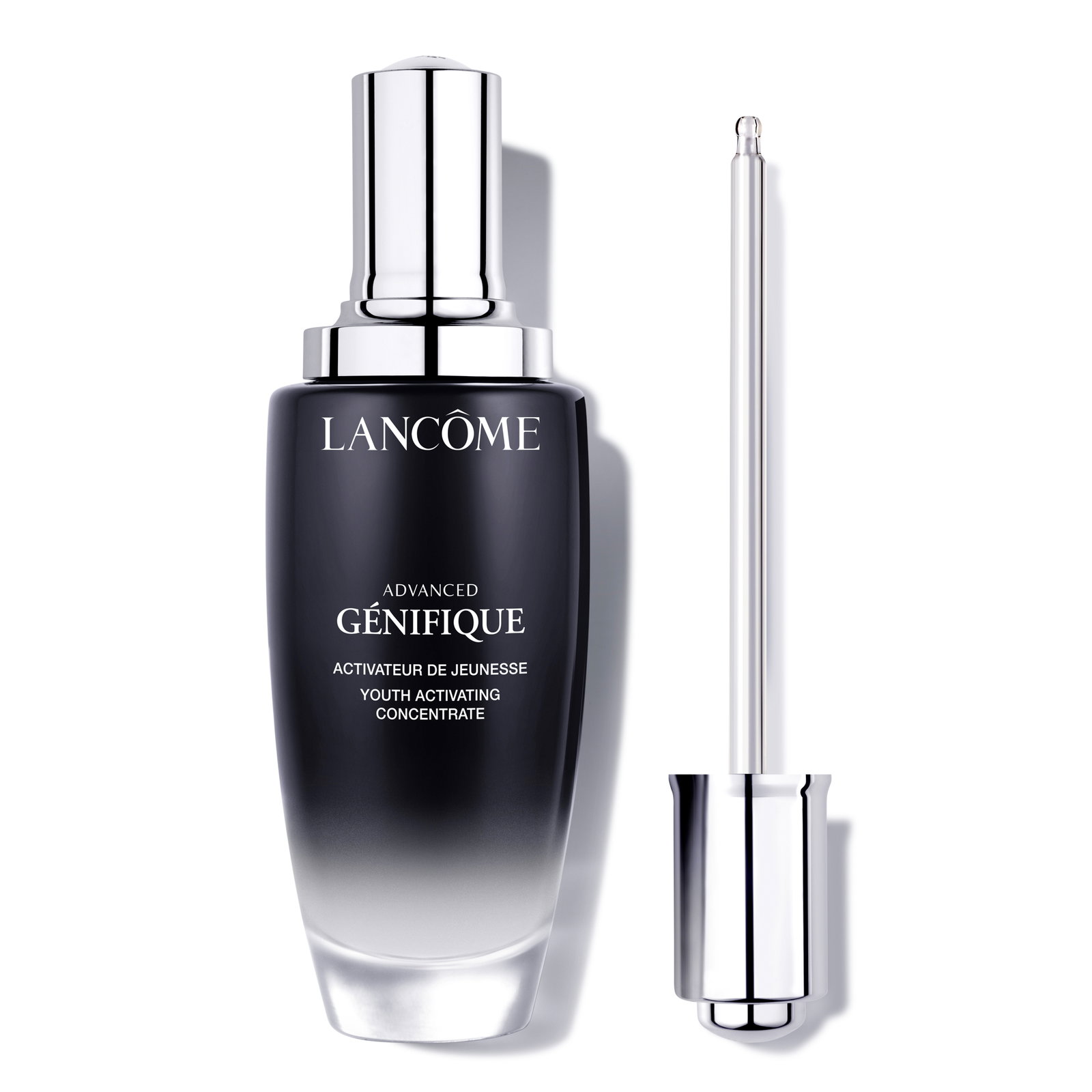 	Flacone Lancôme Advanced Génifique in vetro nero con contagocce in argento, su sfondo bianco.