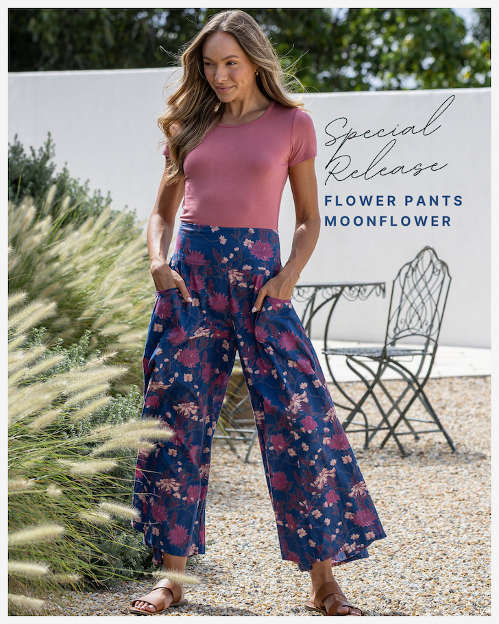 model wearing a wide leg cotton pants in purple