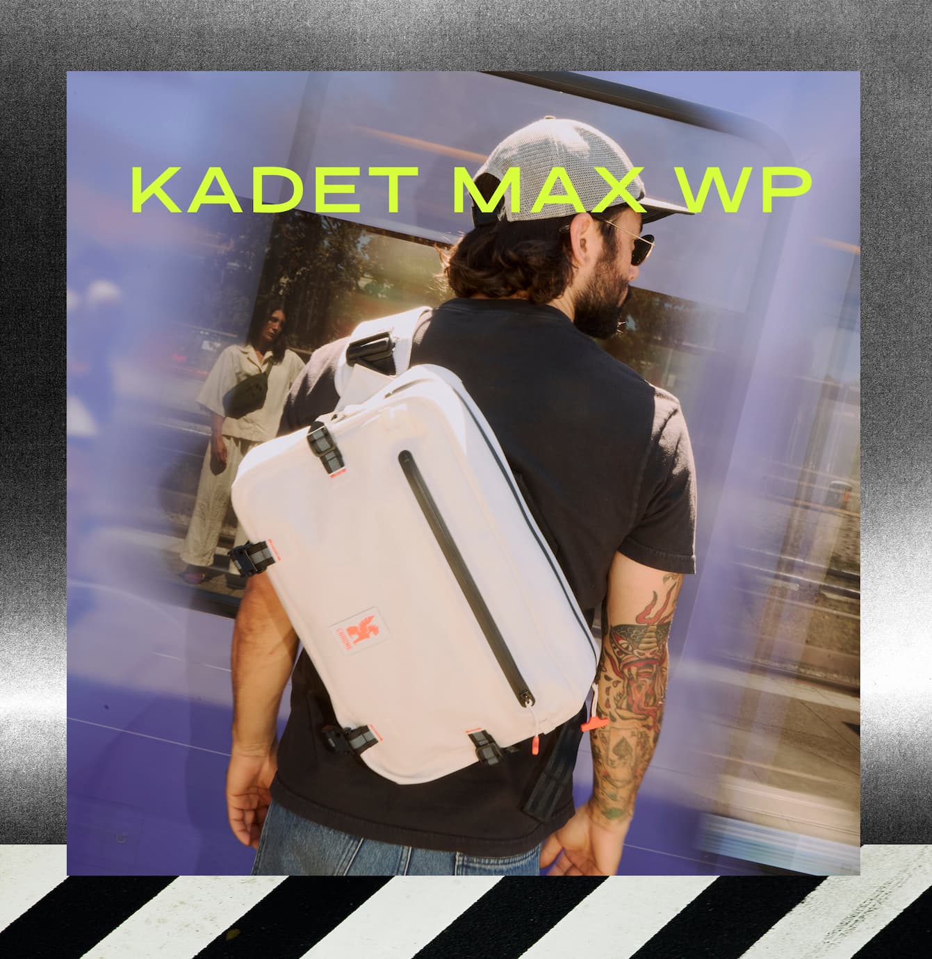 A guy waiting for the train wearing an on sale Kadet Max WP