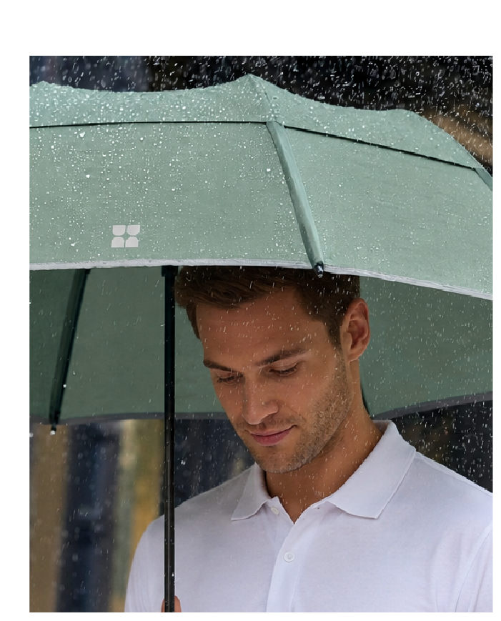 Man using Trek Umbrella in Sage