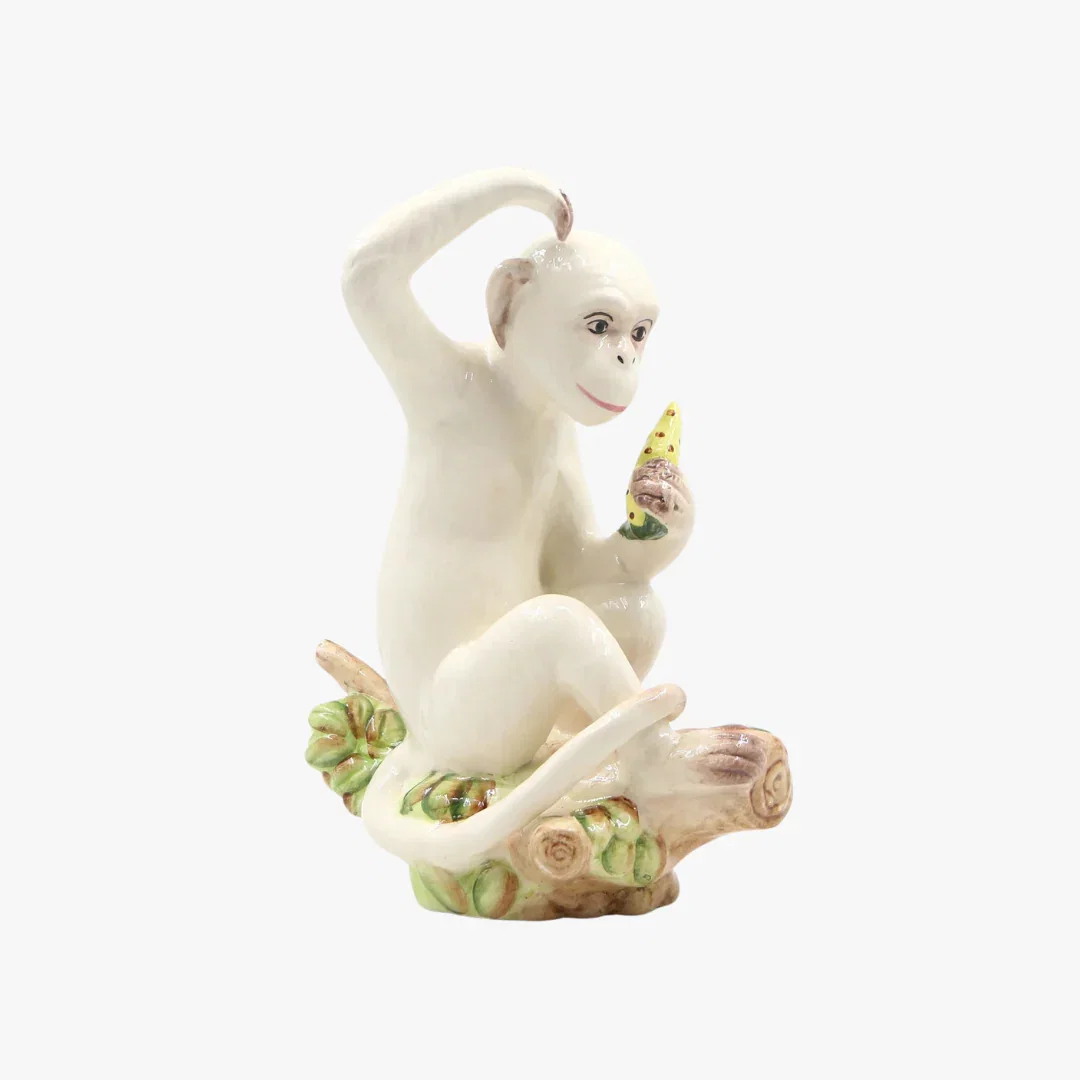 Image of Left Facing Monkey Figurine