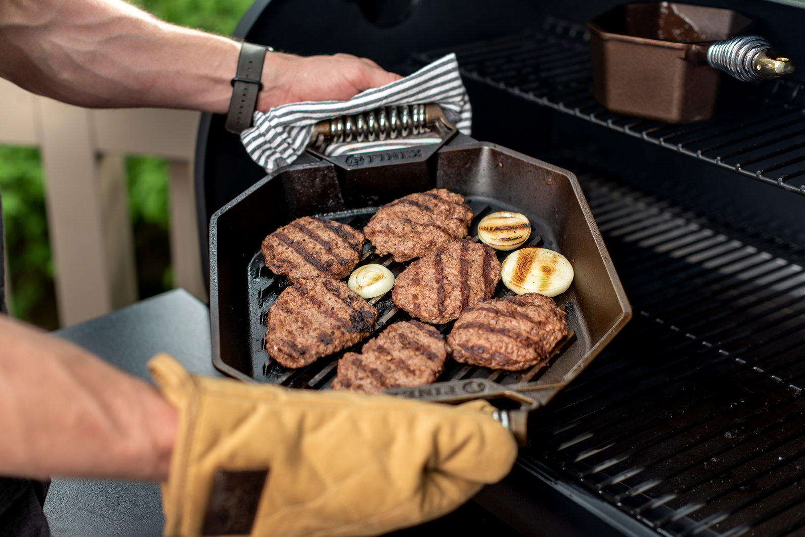 Grilling Burgers at outdoor BBQ in FINEX Grill pan