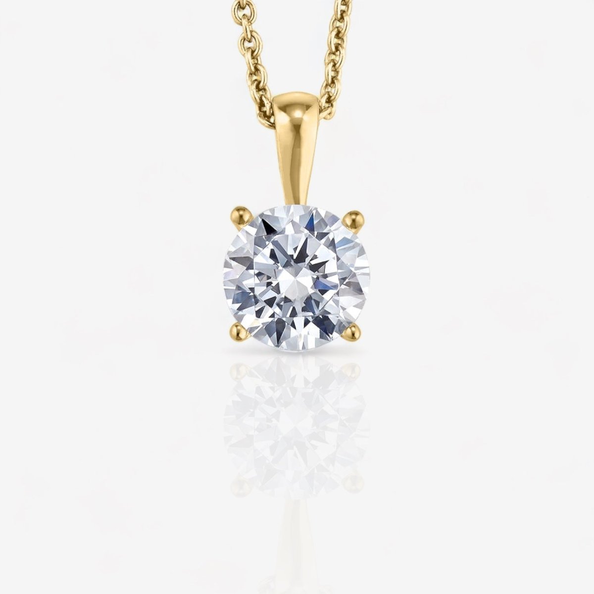 four prong diamond pendant