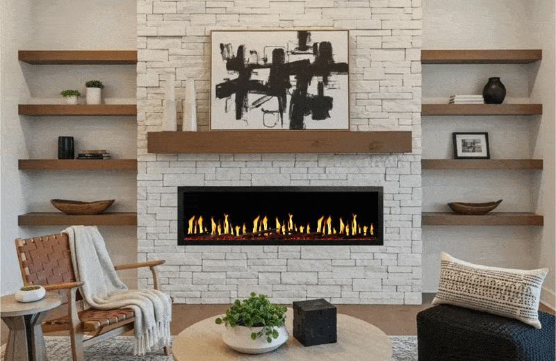 Modern living room with fireplace and art piece.