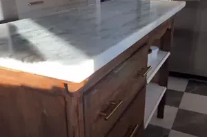 Instead of putting an island in her small kitchen, she did THIS and it's just as good (quite genius!)