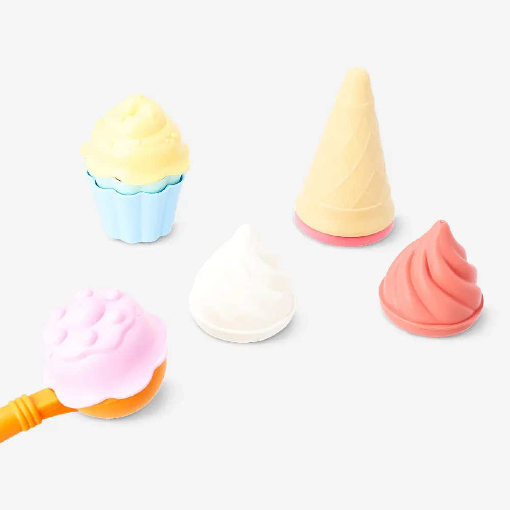 Image of Ice cream sand moulds with spoon