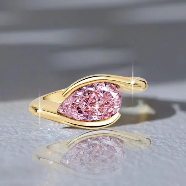 Italo East West Pear Cut Pink Sapphire Engagement Ring