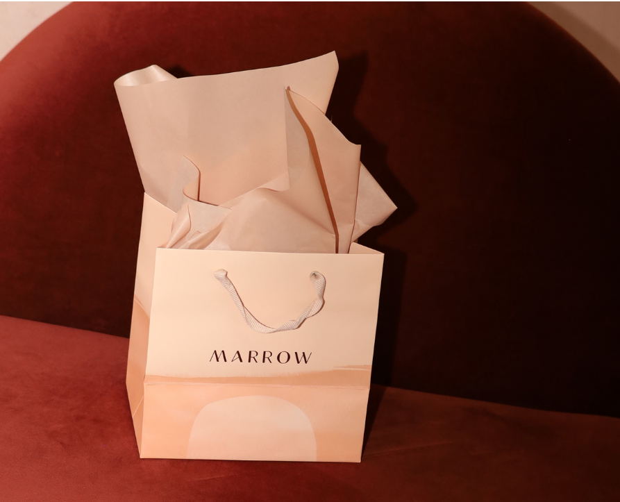 Marrow shopping bag against velvet couch