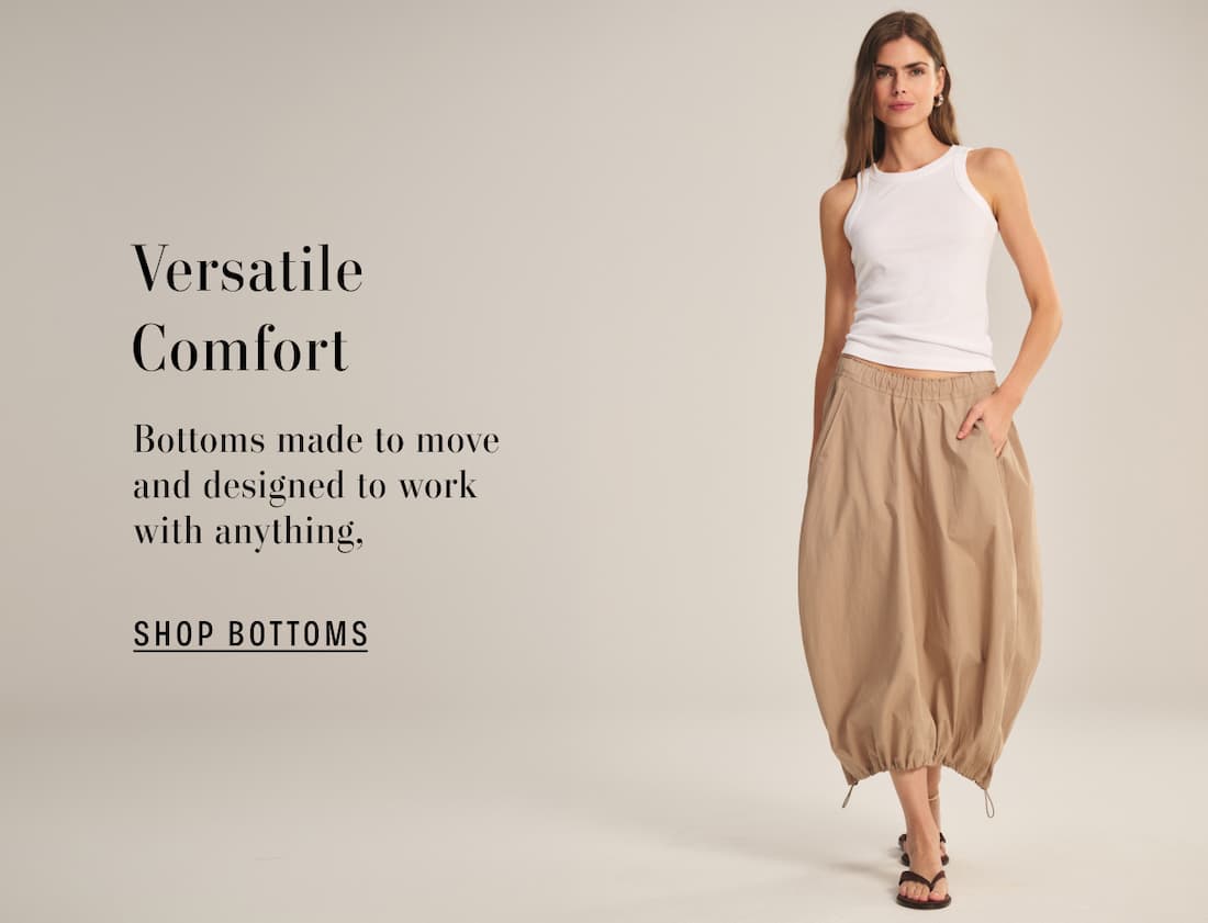 Versatile Comfort. Bottoms made to move and designed to work with anything. Shop Bottoms. Model wearing Cruz Tank and Hollis Skirt. 