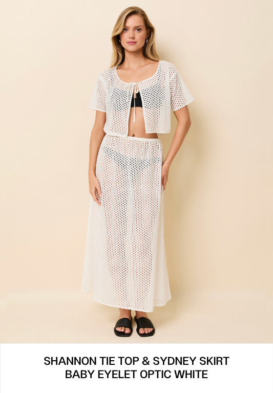 Woman in while top and skirt