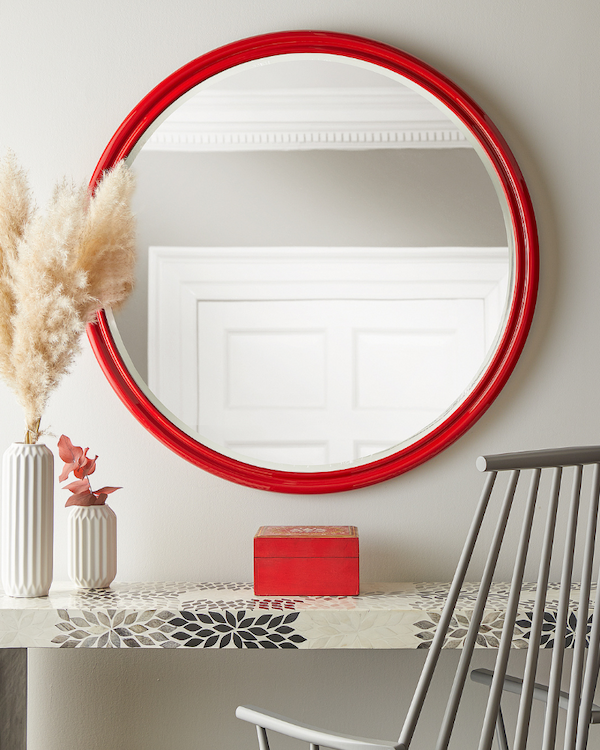 larger cinders mirror in ruby red