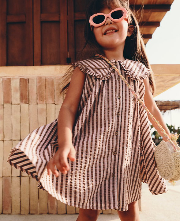 Girl wearing an Ivory Pure Cotton Stripe Collared Dress