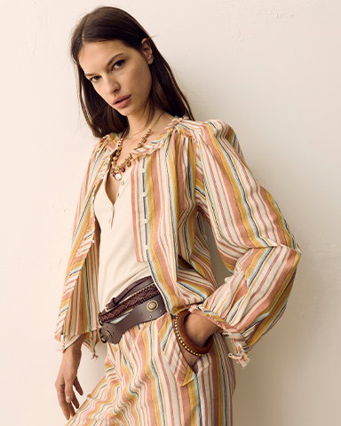 Woman wearing a Pink Mix Per Una Pure Cotton Striped Blouson Sleeve