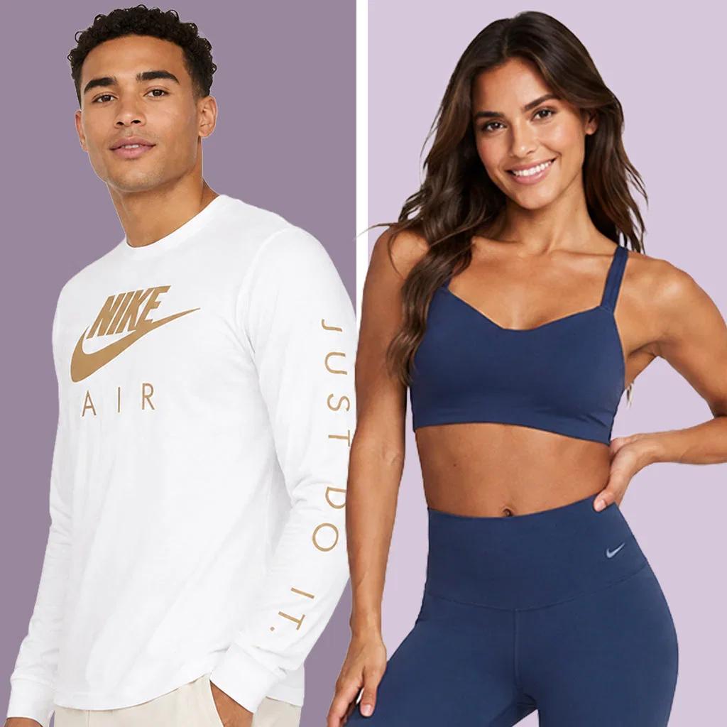 Male and female models wearing Nike apparel including a white long-sleeve shirt and navy sports bra and leggings set against a purple background.