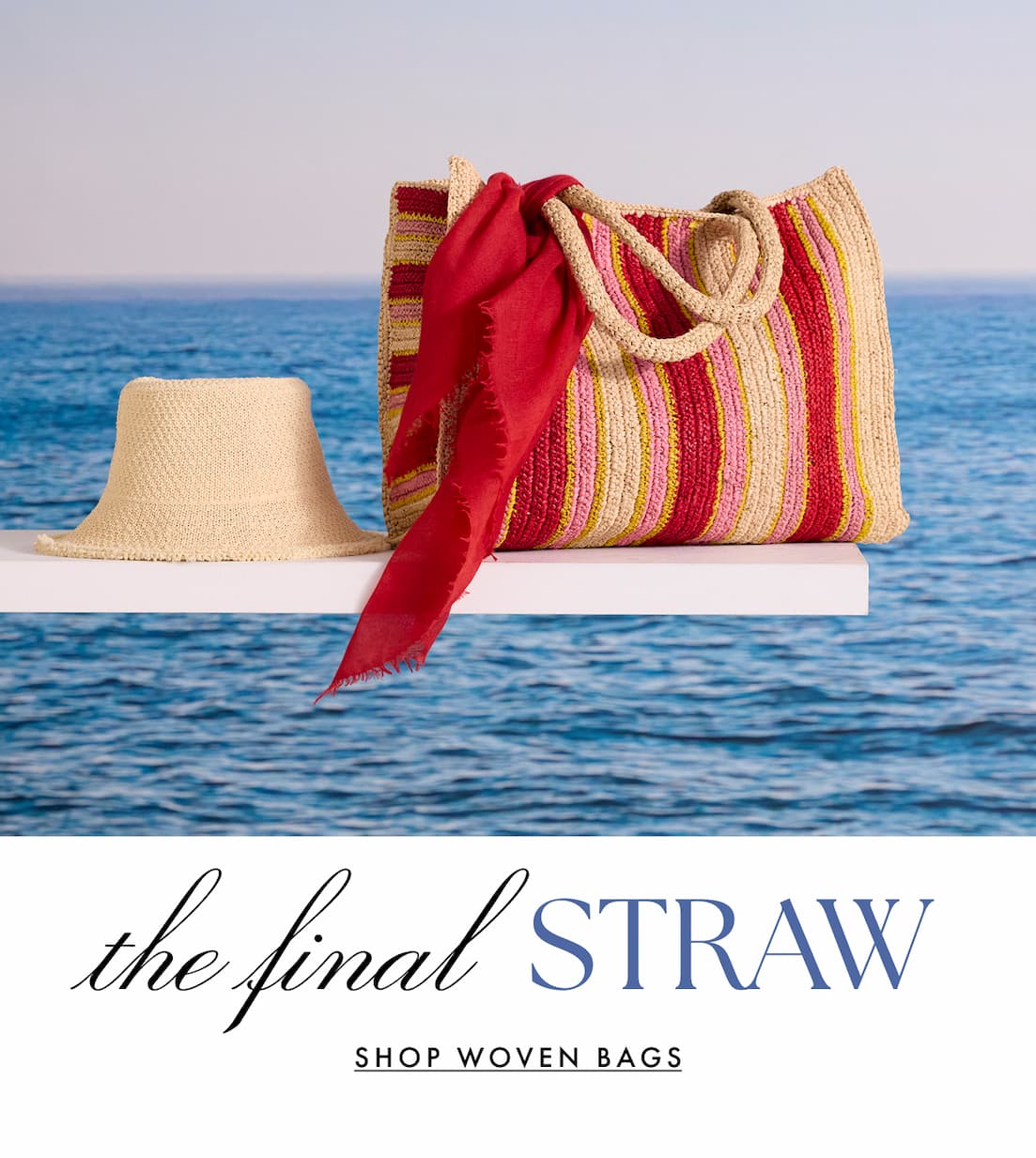 The final straw. Shop Woven Bags. The Hat Attack Arlington Stripe Tote resting on a deck.