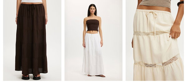Three women modeling brown, white, and cream maxi skirts.