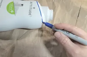 Cut the tops off of used shampoo bottles to make them look super high-end
