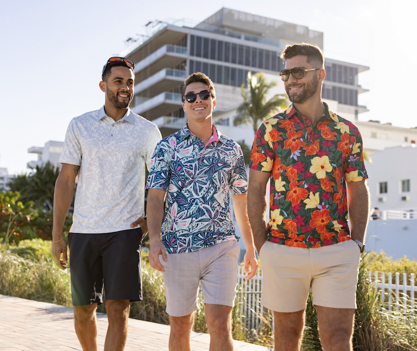 Three men wearing Breakfast Balls Spring Polos