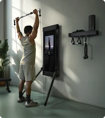 Man working out with Tonal 2 Smart Home Gym in industrial loft