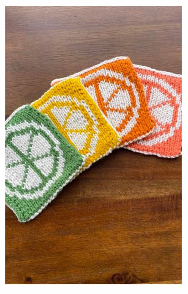 Four coasters that resemble slices of citrus fruits. >>
