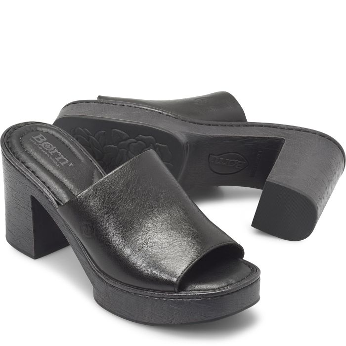 Nix heeled slide sandal in black.