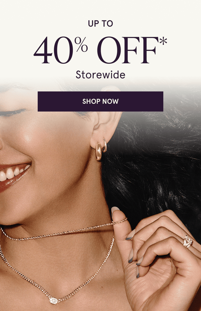 A model wearing gold and diamond jewelry. Up to 40% off storewide. Click here to shop now