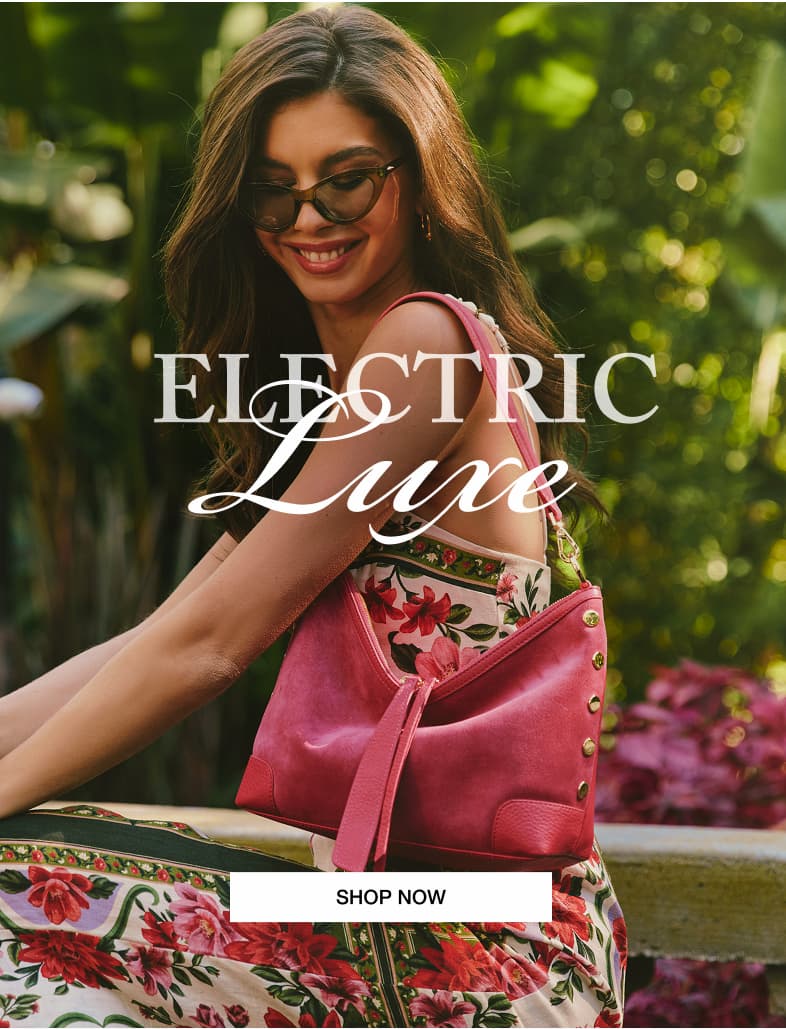 Electric luxe. CTA: Shop now. Model with Gracie bag in calypso suede brushed godl. 